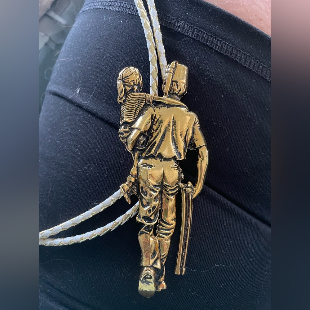 Gold tone Shriner bolo